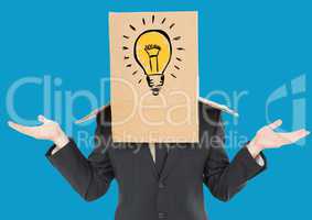 Businessman gesturing with a cardboard box on his head with light bulb