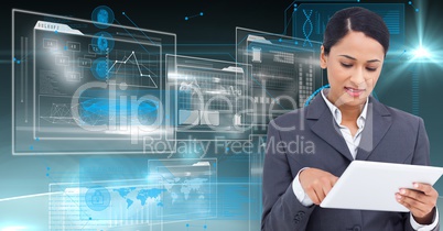 Digital composite image of a businesswoman using digital tablet
