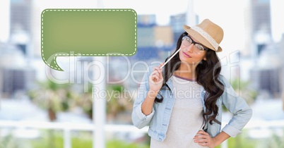 Woman looking at speech bubble icon