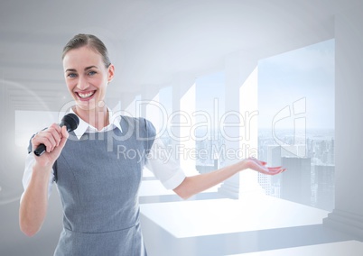 Businesswoman speaking on microphone