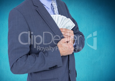 Businessman putting dollar banknotes into the chest pocket
