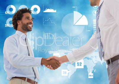 Business professionals shaking hands against technology background