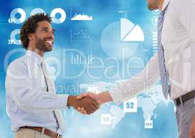 Business professionals shaking hands against technology background