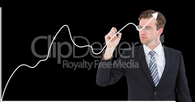 Businessman drawing growth graph against black background