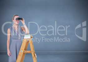 Female executive standing on success ladder and looking through binocular