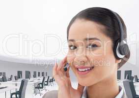 Portrait of a smiling businesswoman talking on headset in office