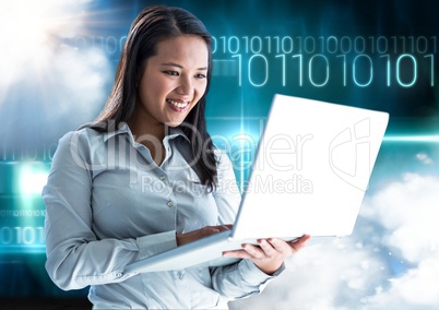 Happy woman using laptop with binary codes in background