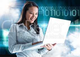Happy woman using laptop with binary codes in background