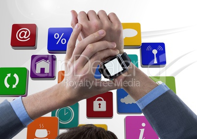 Man using smartwatch against application icons in background