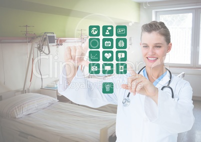 Doctor touching digitally generated medical icons