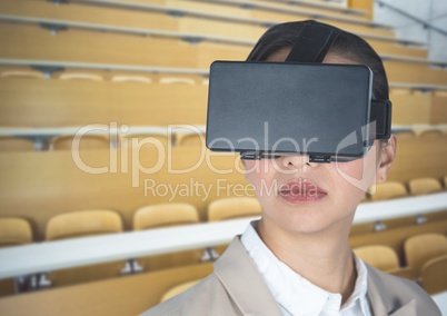 Businesswoman using virtual reality headset