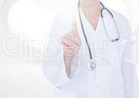 Doctor with stethoscope touching the digital screen