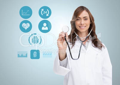 Portrait of smiling doctor showing stethoscope with icons on digital screen