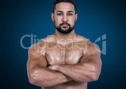 FitnessMuscular man standing with arms crossed against blue background