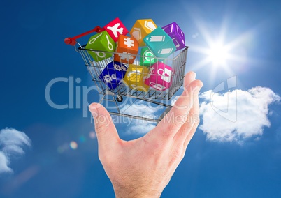 Digital composite image of man hand holding a shopping cart