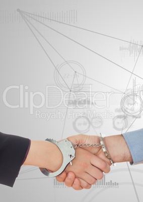 Business professionals shaking hands with handcuff against digital interface in background