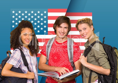 Friends with backpack standing against american flag in background