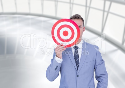 Businessman holding a target