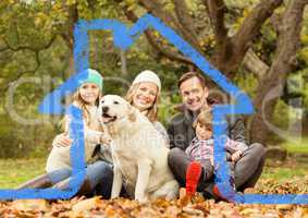 Cheerful family and dog overlaid with house shape in park