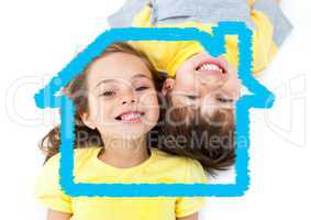 Happy kids overlaid with house shape