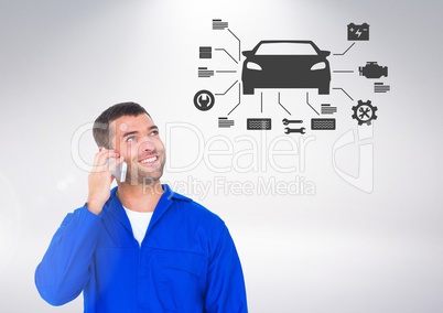 Conceptual image of mechanic talking on mobile phone while looking at vector car sign