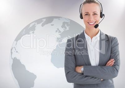 Portrait of customer service woman with headphone standing with arms crossed against world map backg