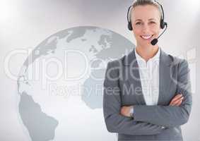 Portrait of customer service woman with headphone standing with arms crossed against world map backg