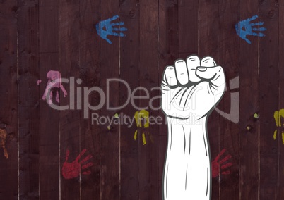 Fist hand against wooden background