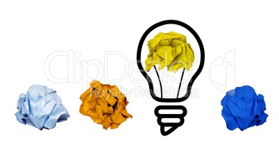 Crumpled papers with light bulb shape on white background