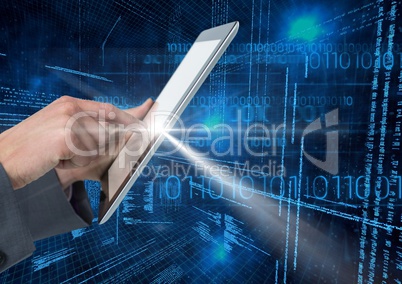 Hand of businessman using digital tablet with binary codes in background