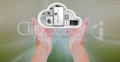 Conceptual image of hand holding a cloud shape with home appliance