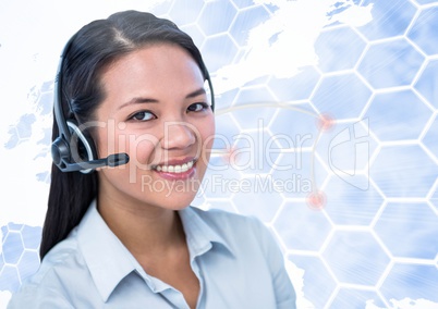 Portrait of happy woman talking on headset