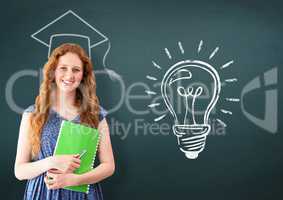 Woman standing and holding book with graduation cap and light bulb in background