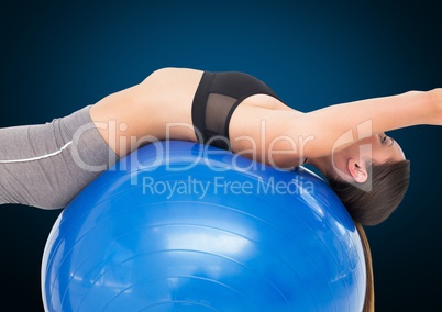 Fitness woman performing exercise using fitness ball