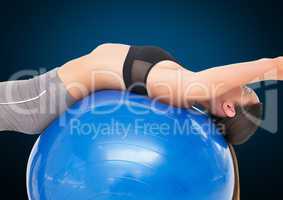 Fitness woman performing exercise using fitness ball