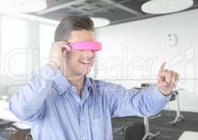 Man using virtual reality glasses at office