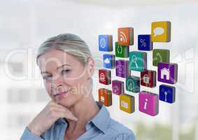 Female executive standing with hands on chin and appliction icons