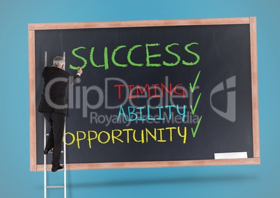 Businessman standing on the ladder and writing success concept on blackboard