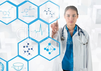 Doctor touching digitally generated medical icons against white background