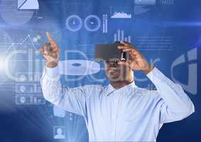 Businessman using virtual reality headset against graph chart screen