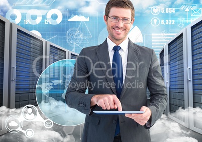 Businessman using digital tablet against data center in background