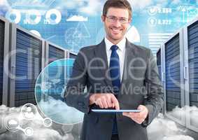 Businessman using digital tablet against data center in background