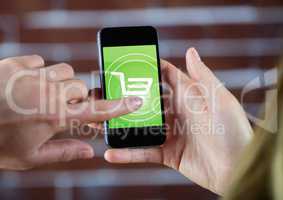 Hands doing online shopping on mobile phone