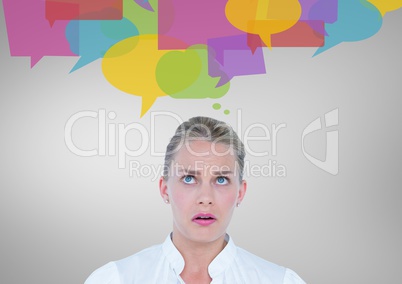 Digital composite image of confused woman with speech bubbles