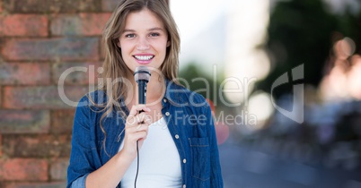 Woman speaking on microphone