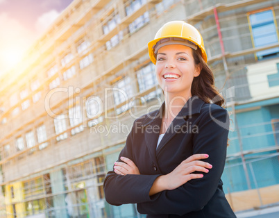 Portrait of Female Contractor Wearing Hard Hat at Construction S