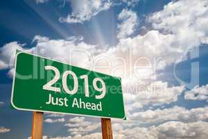 2019 Green Road Sign Over Clouds