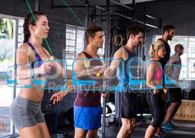 Group of people exercising in gym
