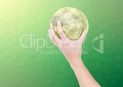 Hand of athlete holding ball against textured green background
