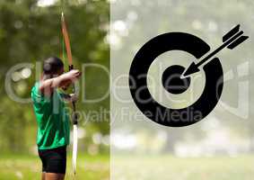 Male athlete practicing archery